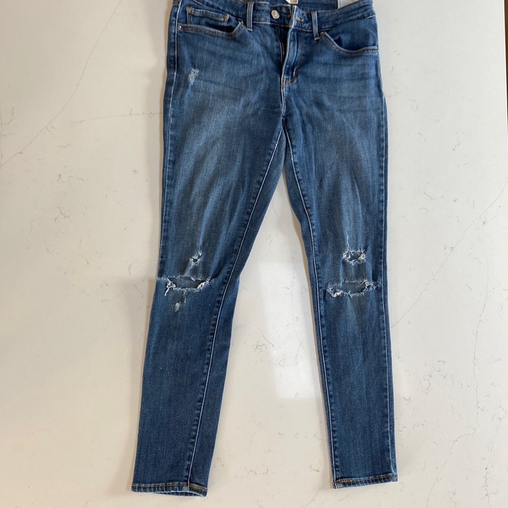 Levi’s 711 skinny distressed jeans